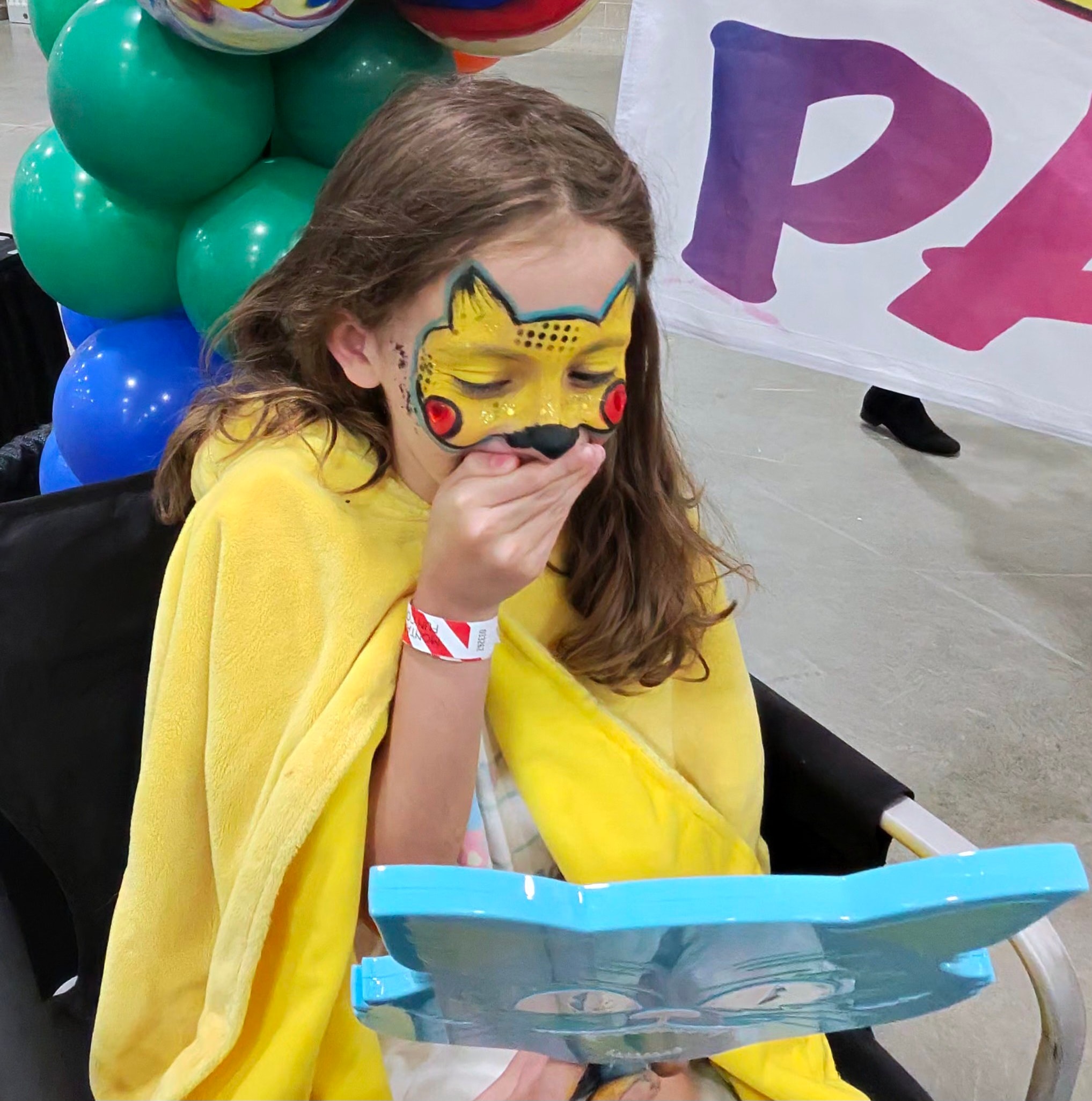 Detailed face-paint artistry at a celebration